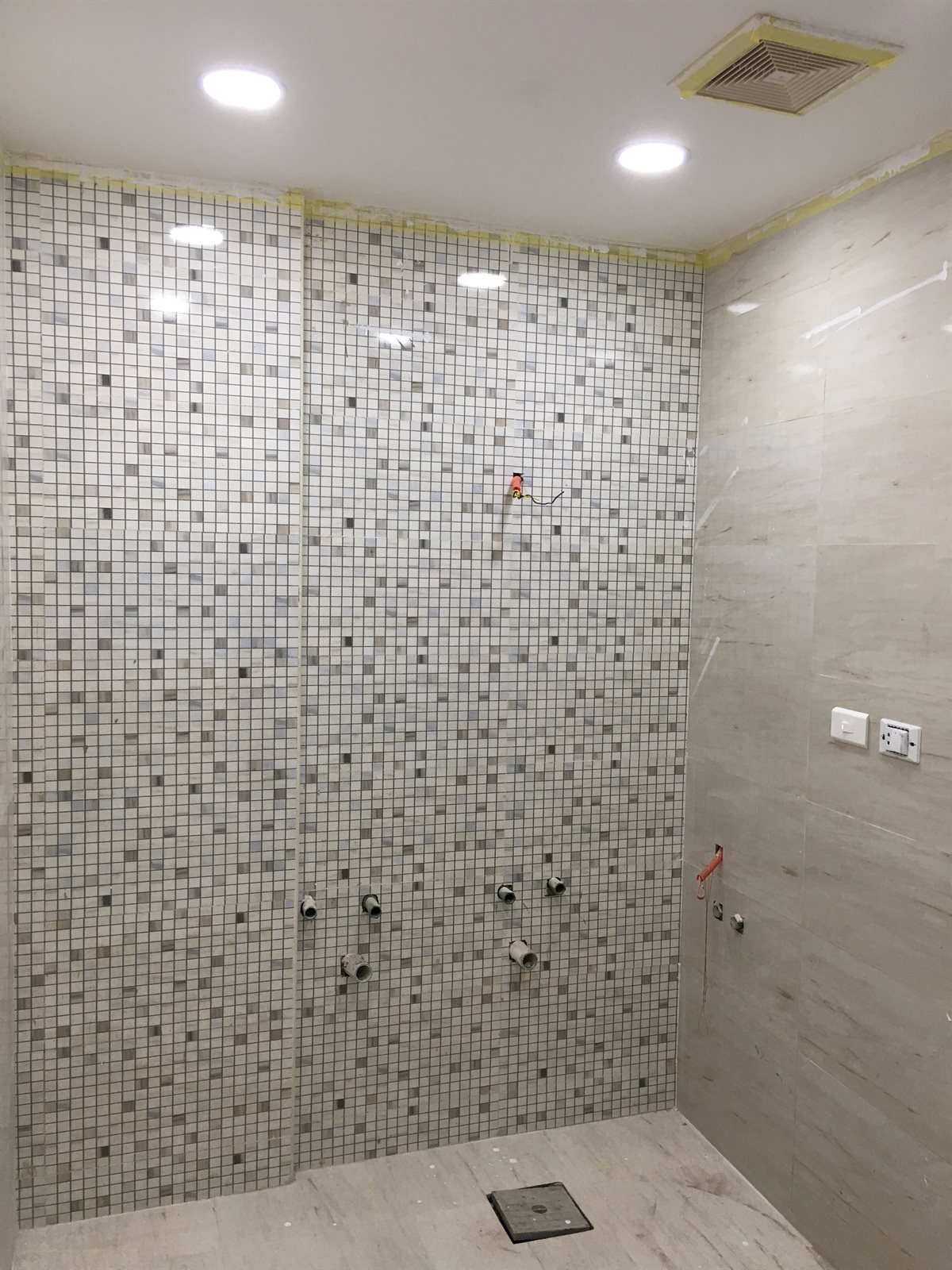 Castel washroom mosaic and marble tiling