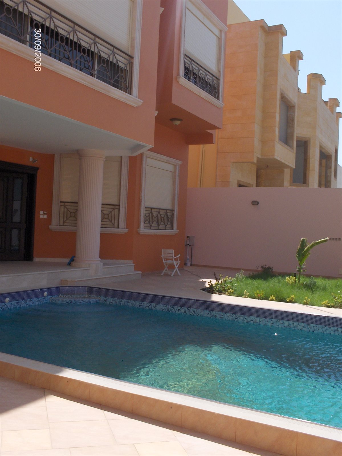 Kamal pool and rear terrace with columns