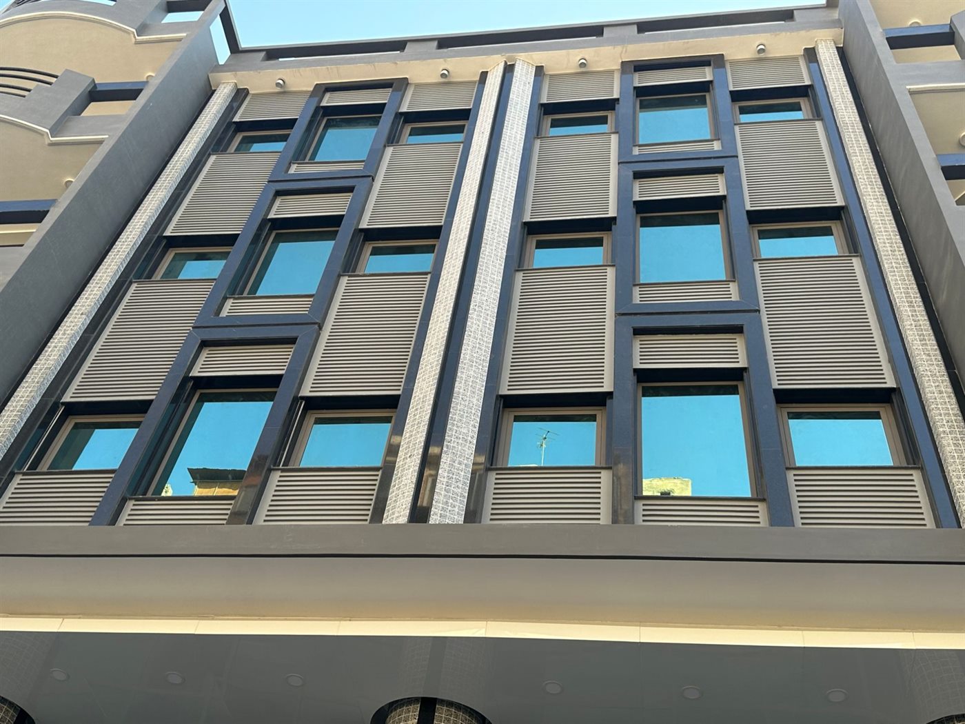 Sheriff Plaza GRC cladding marble and aluminium windows facade