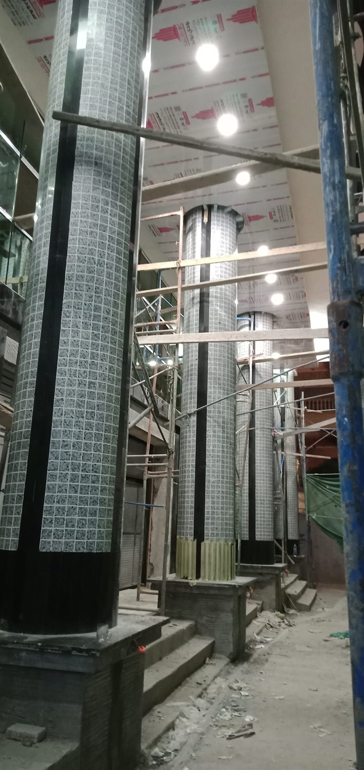Sheriff Plaza lobby clad columns and false ceiling