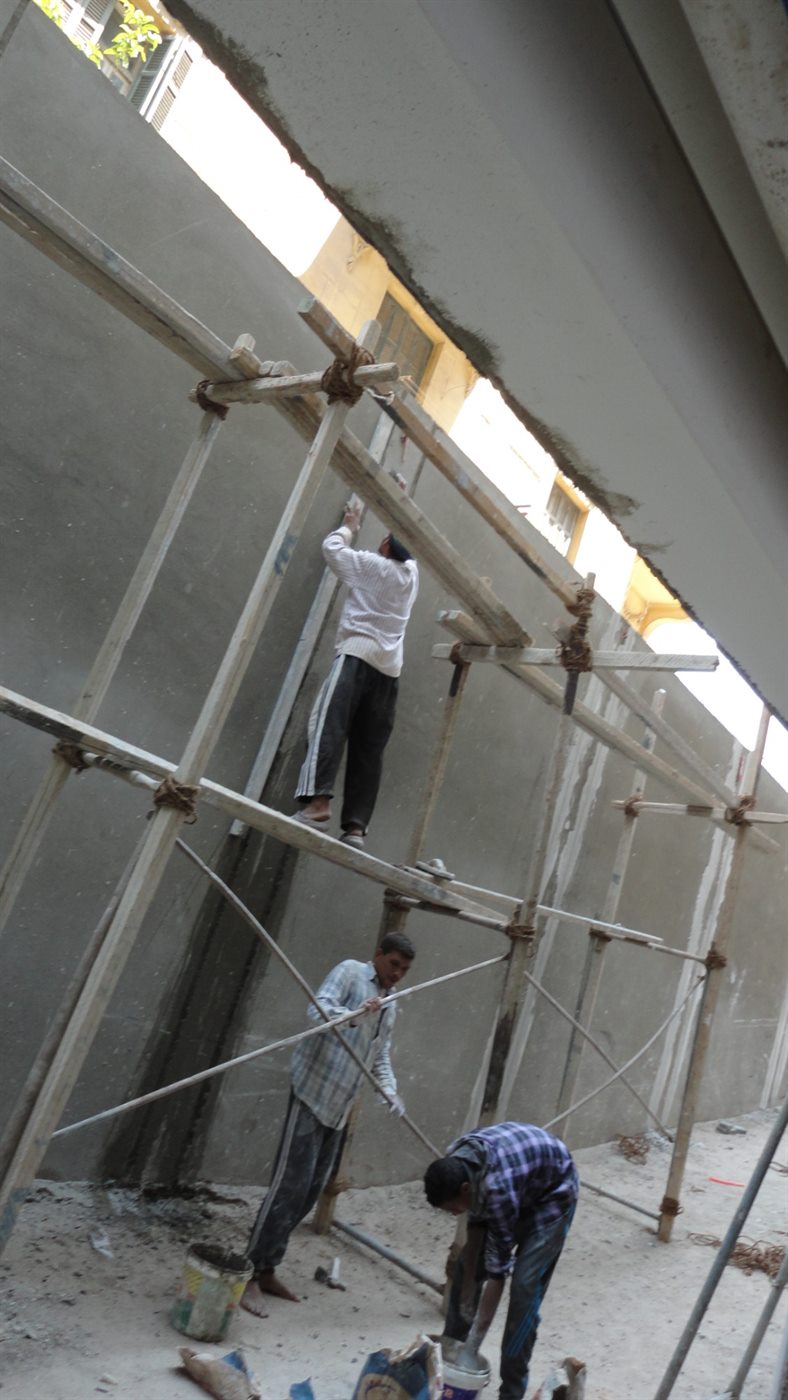 Sheriff Plaza facade plastering in progress